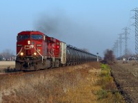 Headed for the border, CP 9625 and 8816 charge westward at mile 98.8 on the CP's Windsor Sub November 16, 2012.