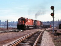 A pair of big MLW's drag an eastbound freight onto the Oakville Sub at Hamilton Junction