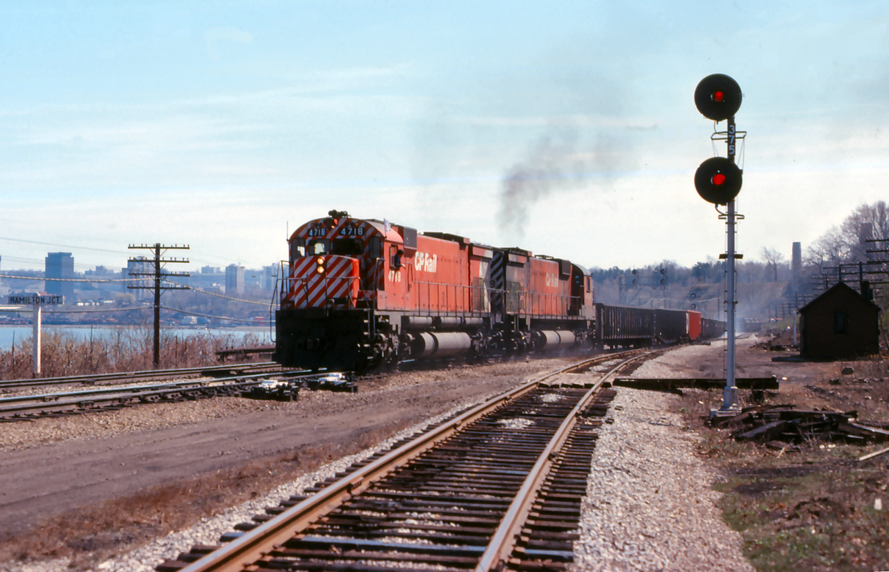 A pair of big MLW's drag an eastbound freight onto the Oakville Sub at Hamilton Junction