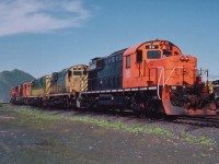 The whole fleet of RSD-15 Alcos on the Cartier roster! Seen are: 96, 91, 93, 92, 95 and 94 tucked back in on Iron Ore Mine property. Known to me as "alligators" due to their long snouts.