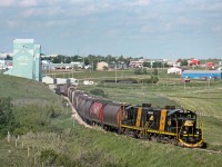 Central Western's Consort turn from Stettler on former CP lines switches the grain elevators at east end Consort yard before heading back west to Stettler. Consort is the childhood home of singer k.d.lang