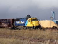 While passing through Hearst, some radio chatter alerted us to the presence of this unit putting a train together. Obviously the primary industry of the area is lumber.