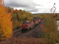 Marty gives an enthusiastic wave from the cab of CP 9813 West as they highball through Levack after spending a few hours setting off cars in Sudbury, on their way to Cartier for a new crew.