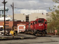 CP 4657 sits paired with 4656, ahed of 5871/5868 paired up together at the shops in downtown Sudbury. 