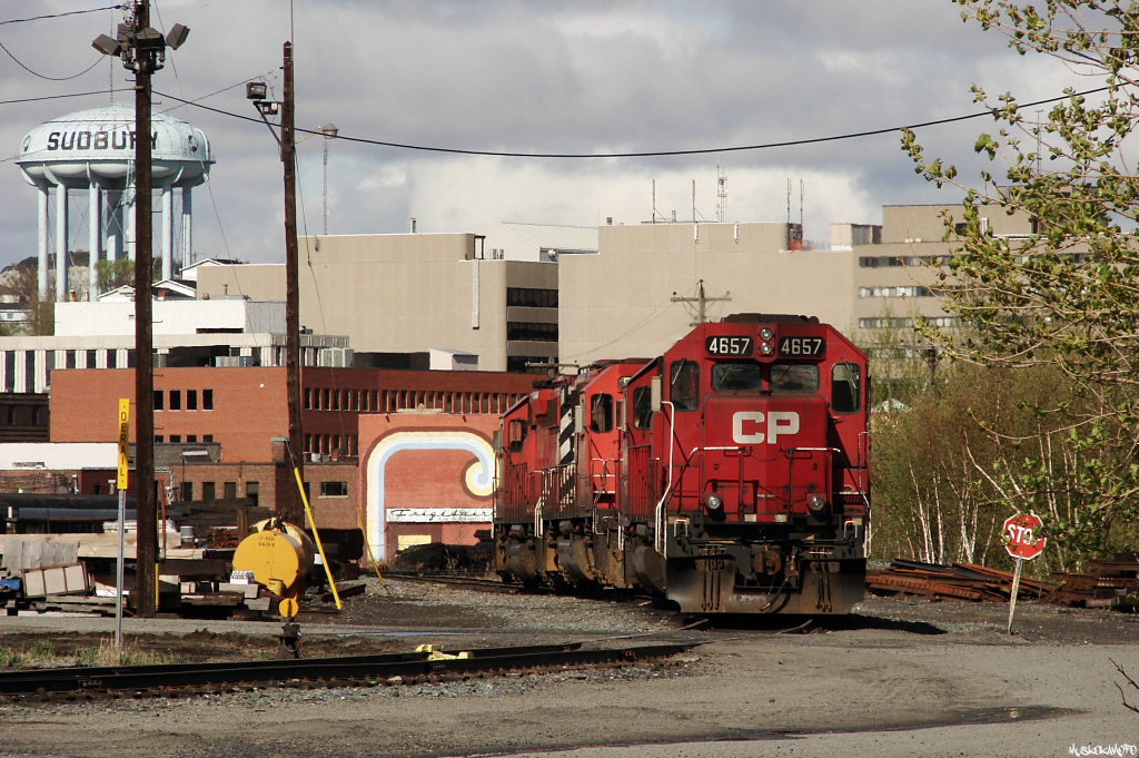 CP 4657 sits paired with 4656, ahed of 5871/5868 paired up together at the shops in downtown Sudbury.
