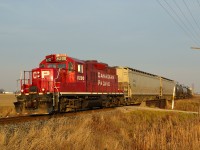 CP T76 with GP9u 8200 running solo, rounds the bend into Tilbury as it heads westbound back to Walkerville.