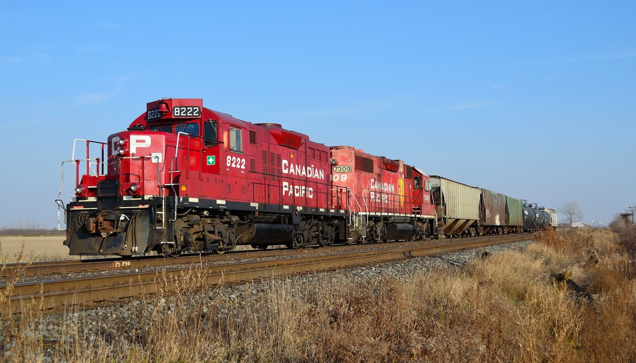 CP T76 waits at the west end of the Tilbury siding for an oncoming eastbound to pass by.
