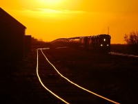 CP 298 departs out of the sunset as it makes it way east out of Wynyard