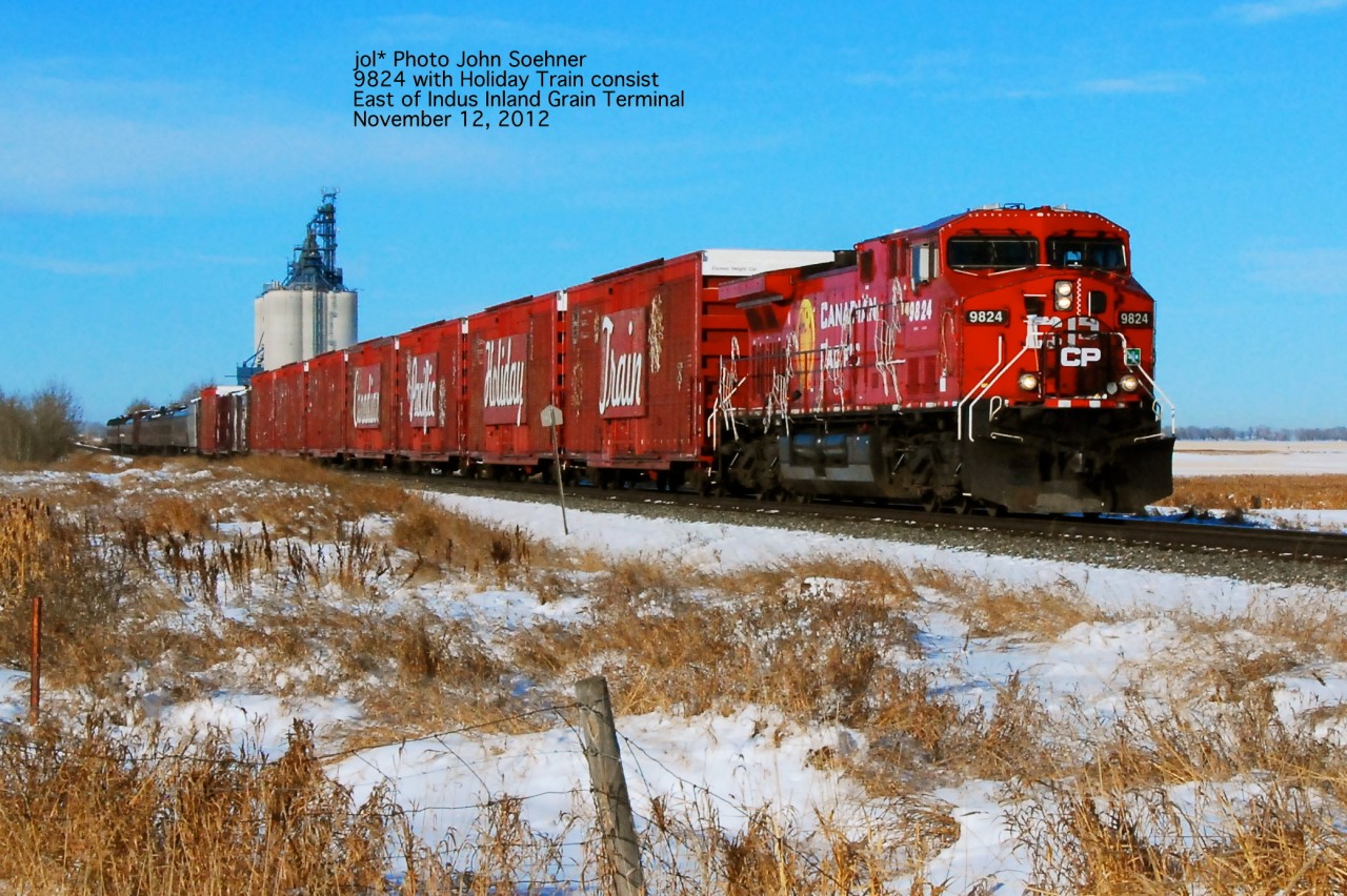 East of the Indus Inland Grain Terminal, mp 156 or so 9824 leads the Holiday Train consist on its way east to Smiths Falls and beyond for the 2012 editions of the Canadian and American Holiday Trains