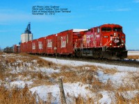 East of the Indus Inland Grain Terminal, mp 156 or so 9824 leads the Holiday Train consist on its way east to Smiths Falls and beyond for the 2012 editions of the Canadian and American Holiday Trains 