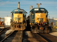 Fresh from a visit to the paint booth canadian district CSX GP38-2 2613 rests among fleet mates including 2690 at Sarnia. 