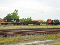 A scene straight out of the 90's! LDSX 1359 showing off her CN heritage sits with fellow CN GP9-slug combo.