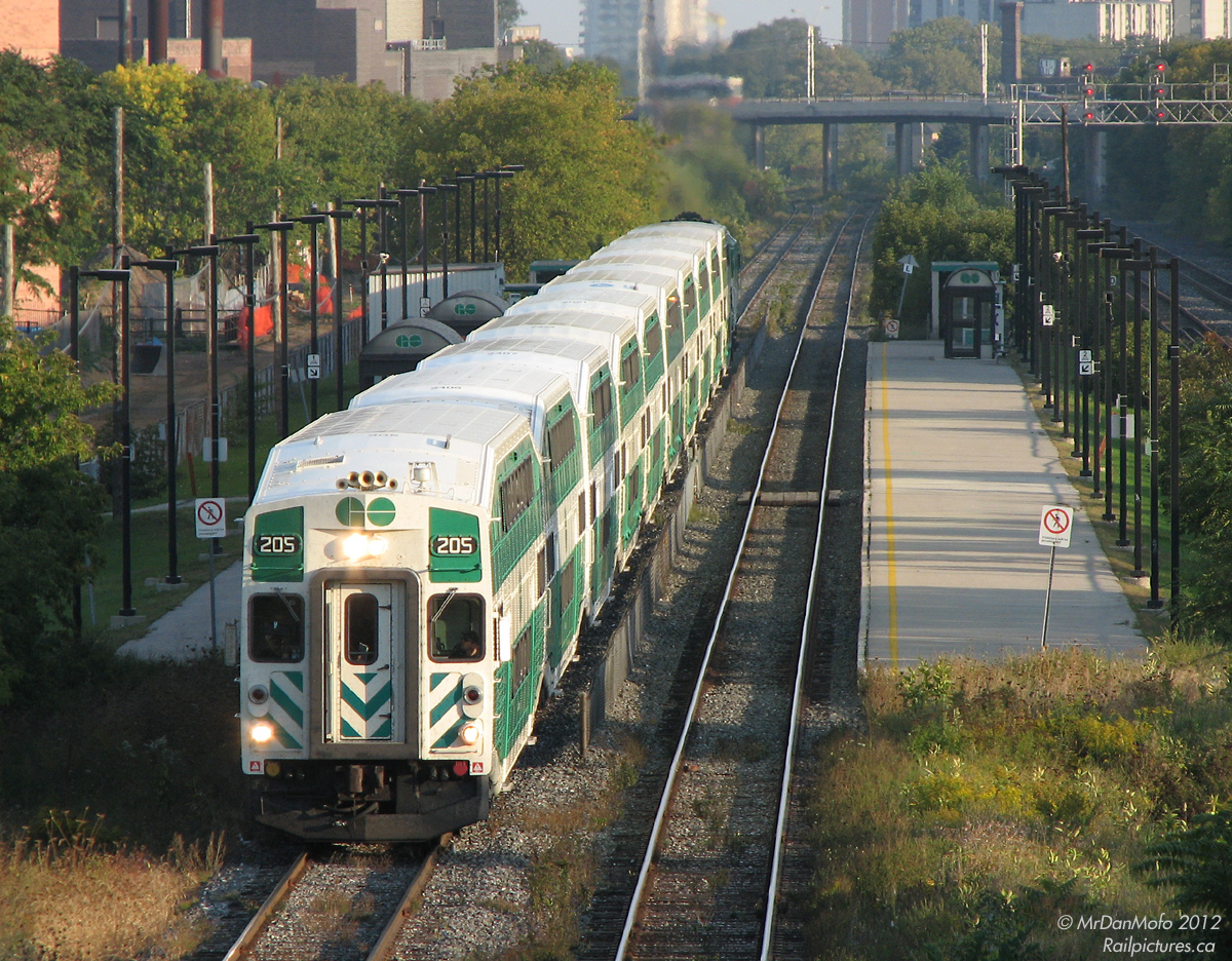 With the last Georgetown train of the evening, GO cab car 205 leads train #211 (the 5:45 out of Union, with relatively new GO MP40 604 pushing) northbound out of Bloor GO Station after just picking up what few passengers frequent that stop. After leaving downtown Toronto, the train passes through the community of Parkdale before arriving here, in "The Junction" (West Toronto). On through Mount Dennis, Weston, Etobicoke, Malton (Mississauga), Bramalea, and Brampton before finally arriving at the commuter compound in Georgetown about an hour later.