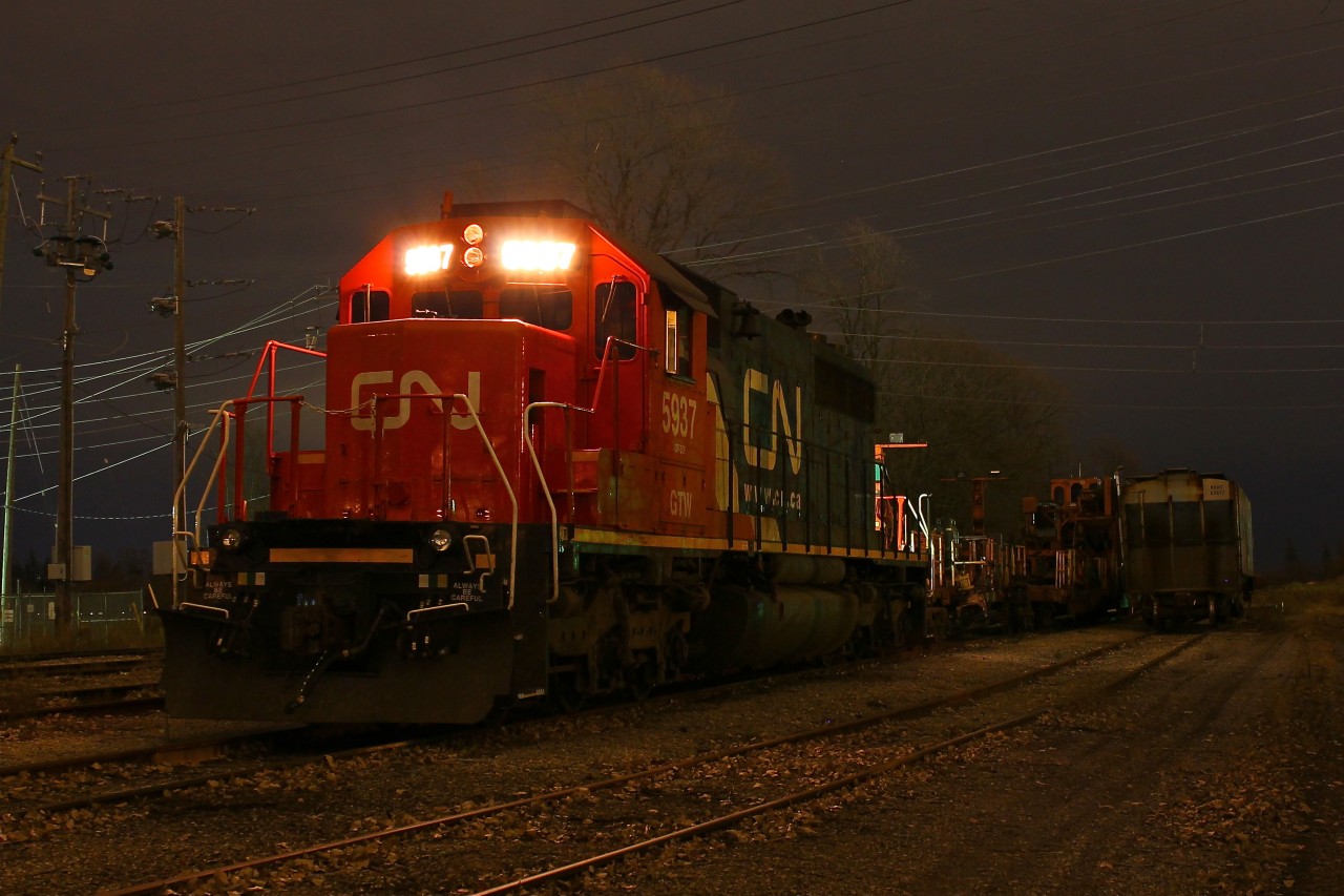CN/GTW 5937 sits waiting to be assigned to the CASO rail train the following day where it would start ripping up the line.