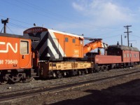 This alternate view of the HBRY classic wreck train gives a better indication of the equipment condition. The boarded up window openings in the van, and the slight sway in the boom idler/coach are tell-tale signs of age and neglect. The Industrial Works s/n 4408 160 ton crane built in 1924 appears to be in the best condition of all three pieces of equipment.