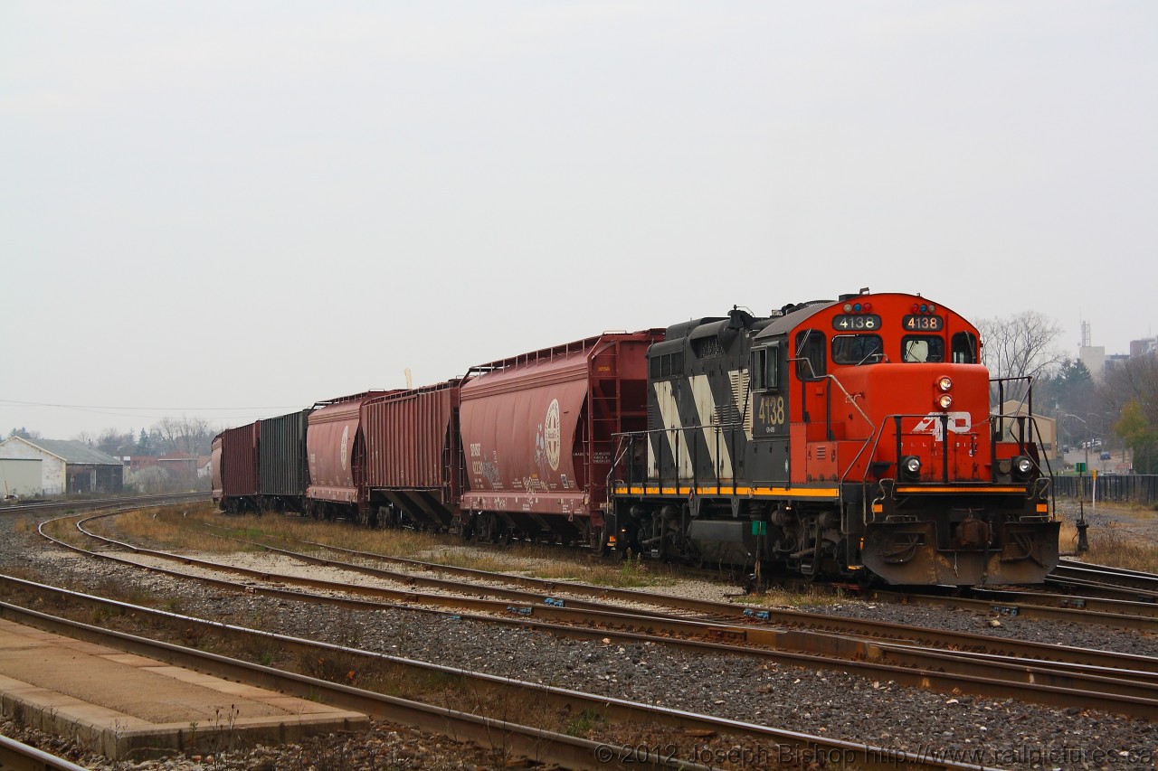 CN 580 is ready to head out of the Brantford yard with a cut of hoppers to go and switch some local industries.  4138 was used in the movie "The Wrong Guy".  The movie was released in 1997 and CN 4138 still has its AR Illinois Lettering on the nose.