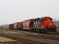 CN 580 is ready to head out of the Brantford yard with a cut of hoppers to go and switch some local industries.  4138 was used in the movie "The Wrong Guy".  The movie was released in 1997 and CN 4138 still has its AR Illinois Lettering on the nose.