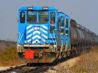 SOR 598 awaits the removal of a restricting flag that is not allowing the crew to get to work in the yard sorting out the cut of cars from that nights work in Paris and Brantford.  They returned with so many cars that they had to split their train in two in order to not block a crossing.  