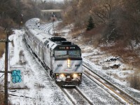 The Silver Bullet streaks through Copetown Ontario on a frigid morning in early January.  This is the first and last time that I would see this unit in the Coors wrap, shortly after this photo Via 6048 was sent to CAD for repainting.