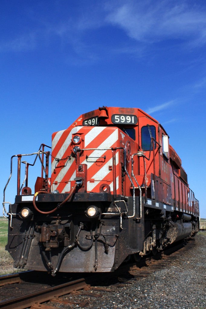 CP 5991 and a second SD40-2 sits parked outside the Esterhazy Potash mine under the wide open prairie sky waiting for a crew from Wynyard to be called.