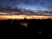 CN X316 digs into Macmillan Yard with a two IC SD70's trailing a C40-8M.