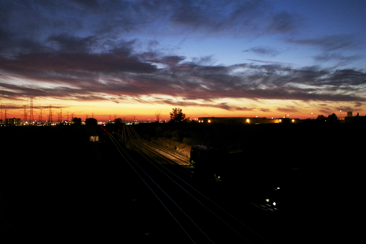 CN X316 digs into Macmillan Yard with a two IC SD70's trailing a C40-8M.