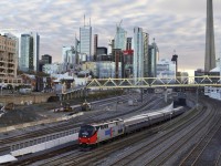 One of Amtrak's 40th anniversary P42DC's leads the outbound Maple Leaf past Bathust St bridge. Amtrak was created to handle and consolidate passenger services from all American roads in the early 70's and this is one of the first schemes that locomotives wore.