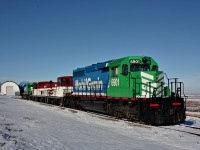 A 5 unit lashup consisting of two SD40-3's and three GE 70-Ton units sit parked at Aylesbury Sk, after a snowfall hit the area.