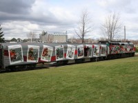 The CFL Train on display on the Sarnia waterfront on the CN Point Edward spur which runs through Centennial Park to serve the grain elevator at the harbour, which looms in the background. This is likely the first time since the early 1900s that any sort of passenger train has been on these tracks. Rare mileage indeed!