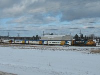 [Editors note - accepted for rarity of passenger train consist] Ontario Northlander waiting at the station in Matheson,ON on a cold December day.