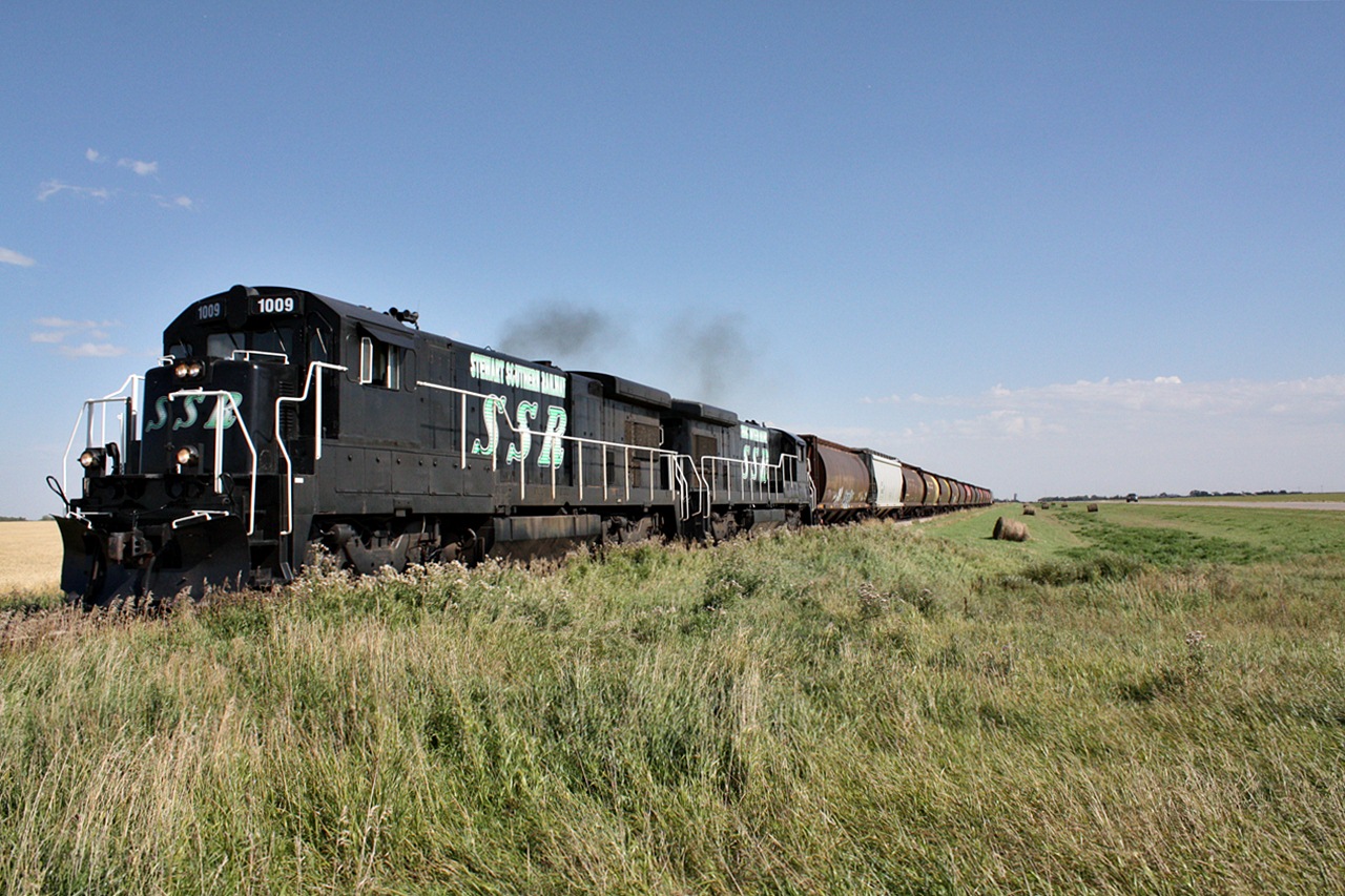 Before the Oil loading facilities SSR was just a grain hauling shortline, seen here on one of there first revenue trains in the railroads history as this was the Grand Opening Train for Stewart Southern Railway.