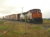 The Hudson Bay Railway has been the lifeline for Churchill and points north since the last spike was driven in 1929. This train from Thompson with it's mixed cargo is an excellent example of the vital role this line plays in northern Manitoba.