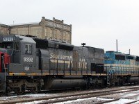 On a cold winter Sunday, GEXR (ex-SP) locomotive 9392 sits idle with GATX 7362 (SD-40-2) behind Kitchener Station.