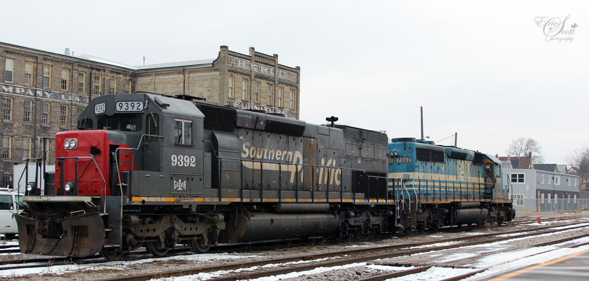 On a cold winter Sunday, GEXR (ex-SP) locomotive 9392 sits idle with GATX 7362 (SD-40-2) behind Kitchener Station.