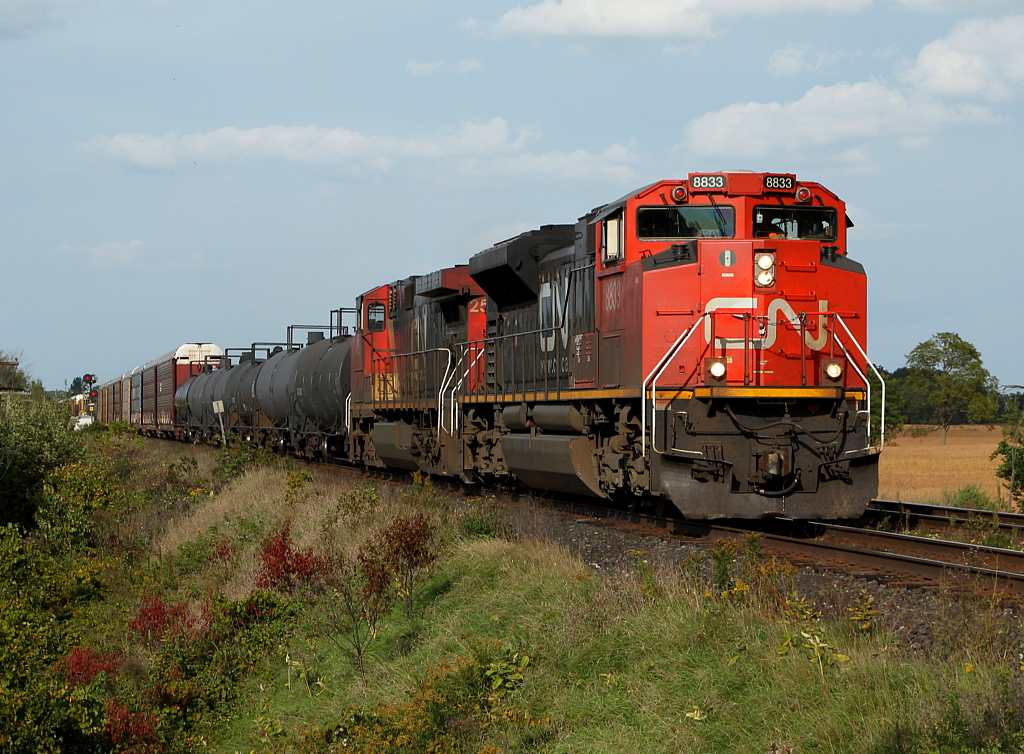 CN 435 hustles towards Brantford, while blowing for the double crossings at Mile 17.
