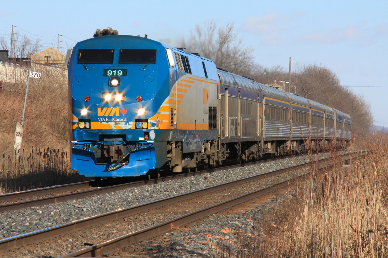 VIA #57 heads west with a mix of HEP-1 and HEP-2 cars on family day weekend.