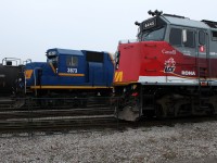 RLK 3873 goes about it's work while 6445 watches on. 
