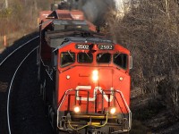 CN 331 powers around the curve at Mile 5.8, with a nice Canadian cab Dash-9 in the lead.