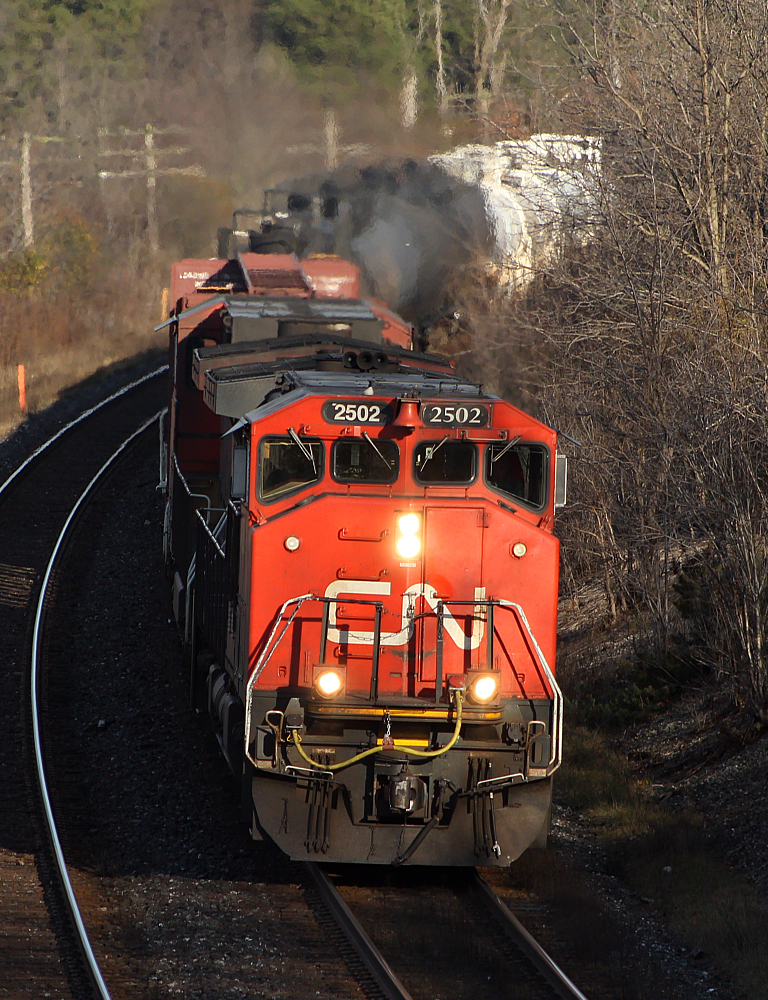 CN 331 powers around the curve at Mile 5.8, with a nice Canadian cab Dash-9 in the lead.