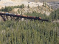 CN A41151 with 5650 crosses the Prairie Creek trestle just west of the town of Hinton in the foothills. 