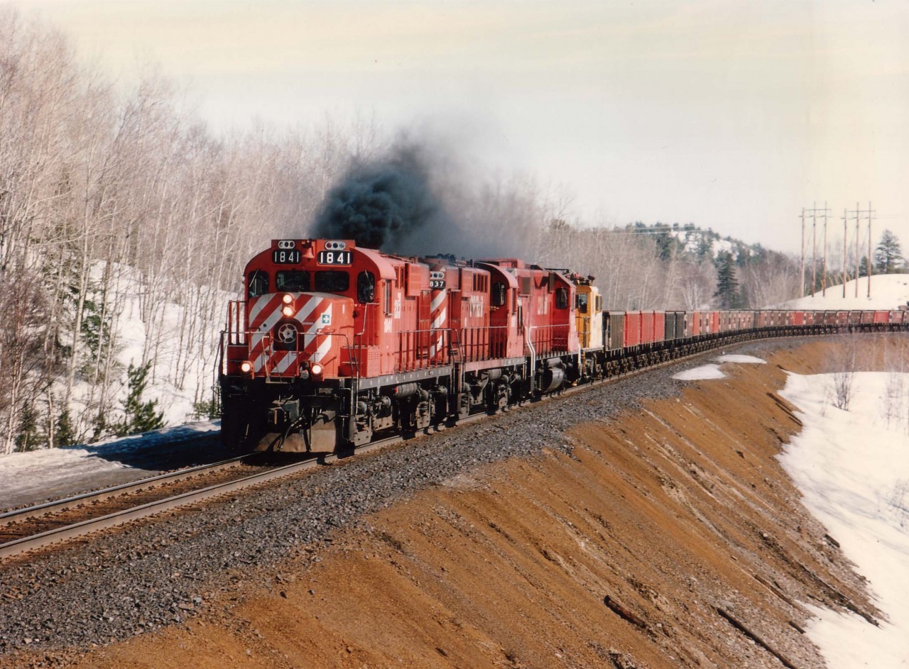 Daily CP/INCO "Job 2" with a long string of empties for the mine at Levack/Onaping, Ontario.
Power is CP 1841, 1837, 3113 and INCO motor 125.