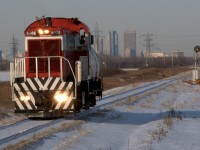 GWWD RS-23 202 with one tank car, heads out of Winnipeg MB to the water treatment plant at Deacon, on the outskirts of the city.
