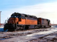 Leased Milwaukee Road SD40-2 # 203 idles at Symington Yard paired up with CN SD40 # 5208