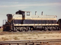  A visit to NAR's Dunvegan Yard (Mile 0.7 Edmonton Sub.)resulted in only seeing this branchline switcher, GMD1 #304 idling out in mid-yard as the crew probably had stopped for lunch. Despite the tough sun angle and all, in retrospect it was a good catch. NAR, which was jointly owned by CN and CP, in 1981 became under the blanket of CN after they bought out CP's share. NAR #304 became CN #1081.  The NAR Shop and yard were demolished soon after the takeover. And the NAR became another chapter in the history books.