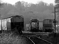 What may look like a CPR unit from the front is in reality OSRX 8235 (ex CP 8235), she and her recently acquired CPR sister OSRX 1210 (ex CP 1210) still in Canadian Pacific colours and lettering work out on switching PDI at the south end of town before heading back to the junction where they call home for the night. 