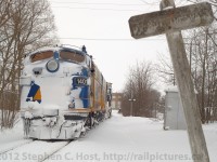 <b>Plow Extra:</b> During the Winter of 2007, strong relentless winds and a couple months of white stuff on the ground caused the ordering of a rare Plow Extra on the Goderich subdivision. During the CN years, this line was well known to host a pair of F units in plow service and was frequented by photographers. With Goderich and Exeter having transferred two covered wagons of their own from Lakeland and Waterways, the ingredients were ripe for a repeat of the covered wagon plow extra!<br><br>Here we see RLK 1401 trailing towards the big shops at Stratford after having spent the better part of a day plowing between Clinton Junction, Goderich, and Stratford. Standing guard is an ancient wooden "Do Not Tresspass" sign - rarely seen and even in this condition, likely dating to the first half of the 20th century.<br><br>The extra would ultimately head to the Stratford Station as seen in this photo link <a href="http://www.railpictures.ca/?attachment_id=1460"> http://www.railpictures.ca/?attachment_id=1460 </a>