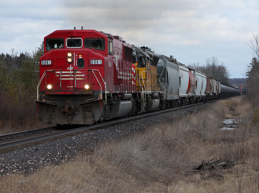CP 627 departs Guelph Jct with a decent lashup.