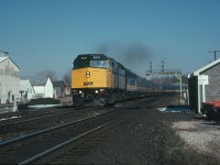 VIA 73, with the 6411 and 6617 leading, charge west through Paris Jct., Ontario