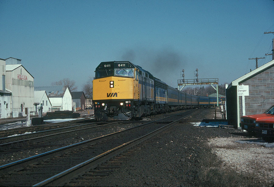 VIA 73, with the 6411 and 6617 leading, charge west through Paris Jct., Ontario
