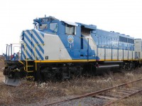 TRT 702 is fully rebuilt, freshly painted, and ready to begin service on the newly formed Tshiuetin Rail Transportation railway.  702 was coupled to TRT 701 and three refurbished coach cars in QNS&L's Sept-Iles, QC yard waiting for a call to duty on this dull October afternoon in 2005.